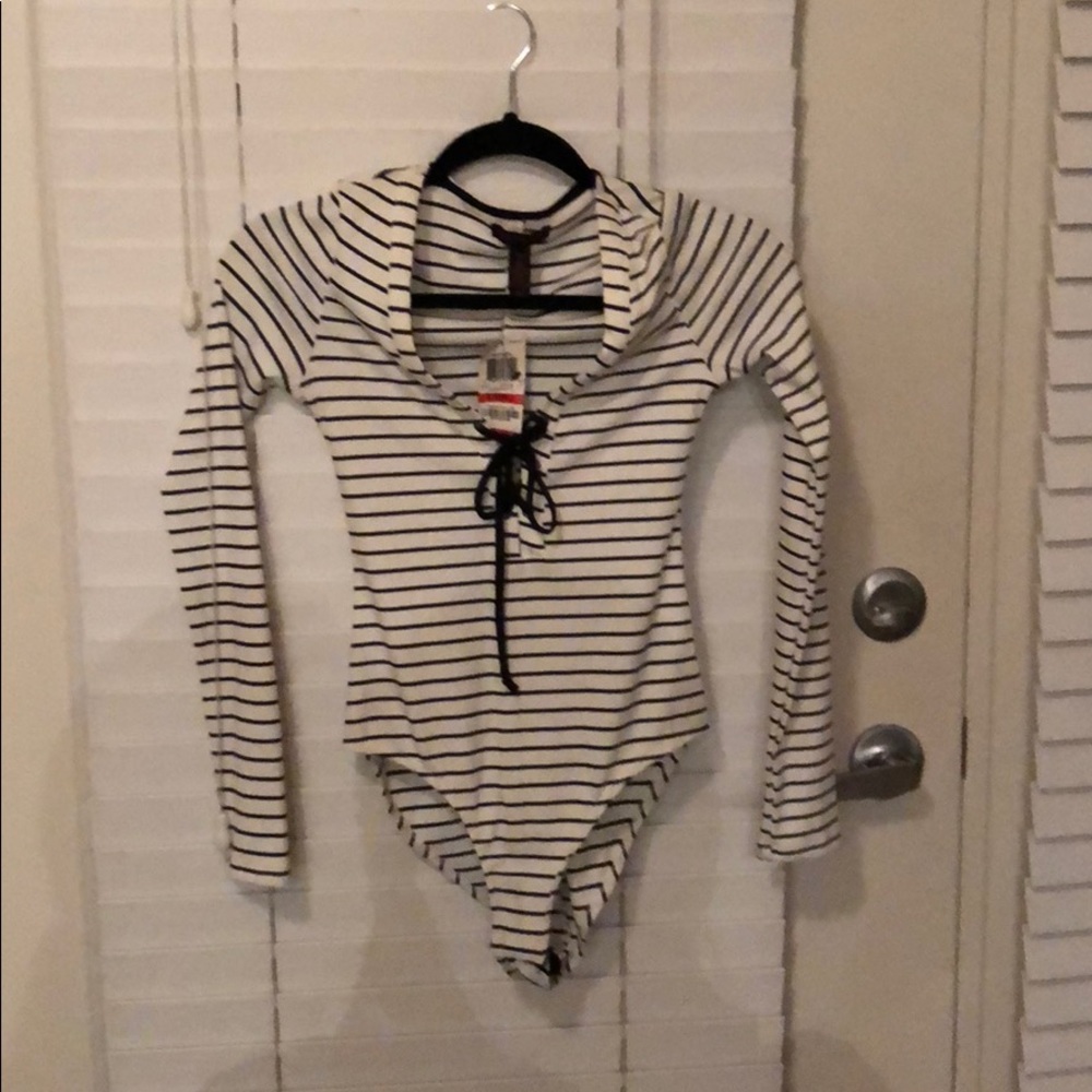 Black and white striped bodysuit.